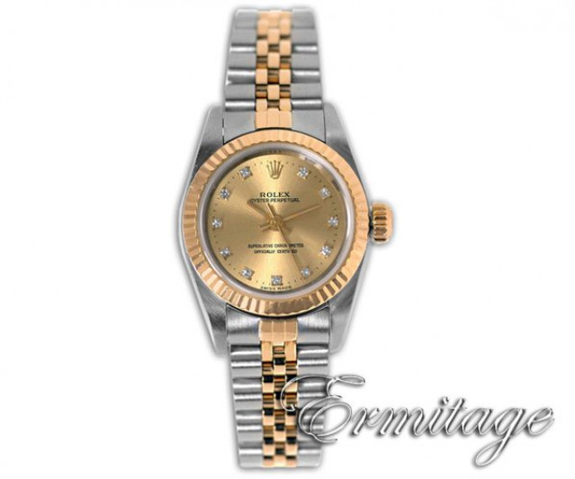 Pre-Owned Two Tone Rolex Oyster Perpetual 67193 with Diamonds